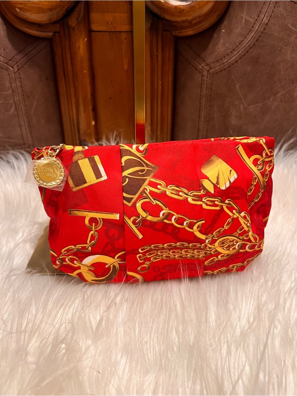 Estee Lauder Red Cosmetic Pouch with Gold Chain Print